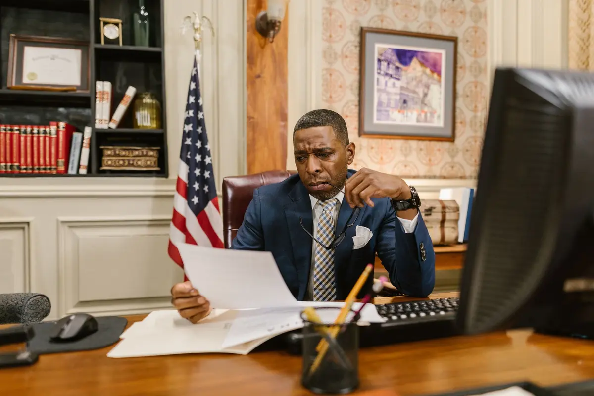 Stock photo: government documents desk laptop
