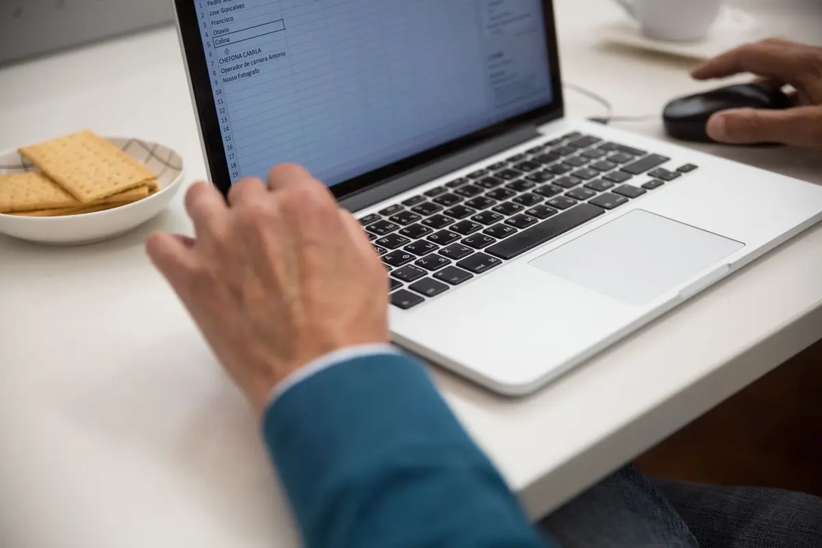 Stock photo: laptop, spreadsheet, desk