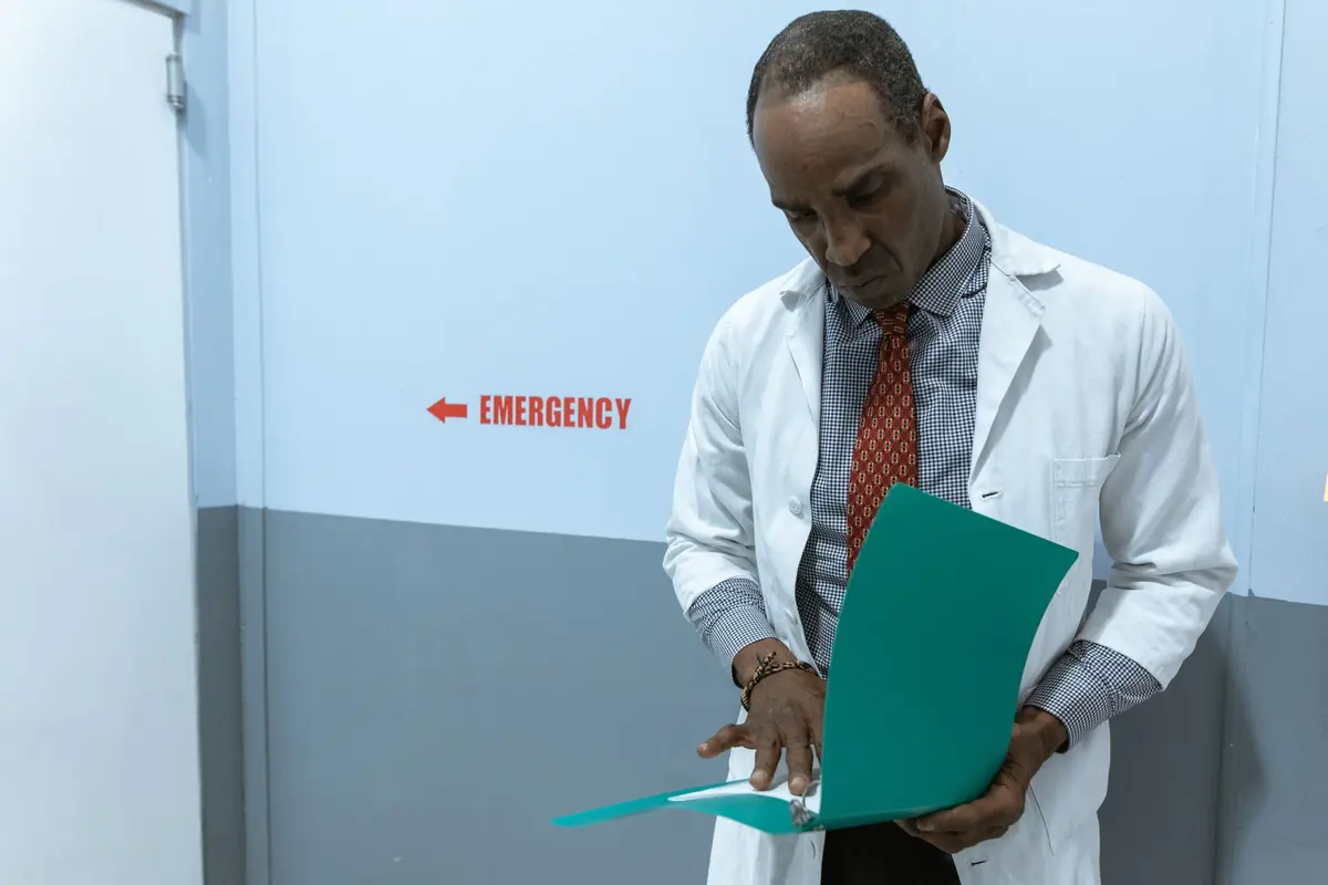Stock photo: hospital corridor, laptop, documents